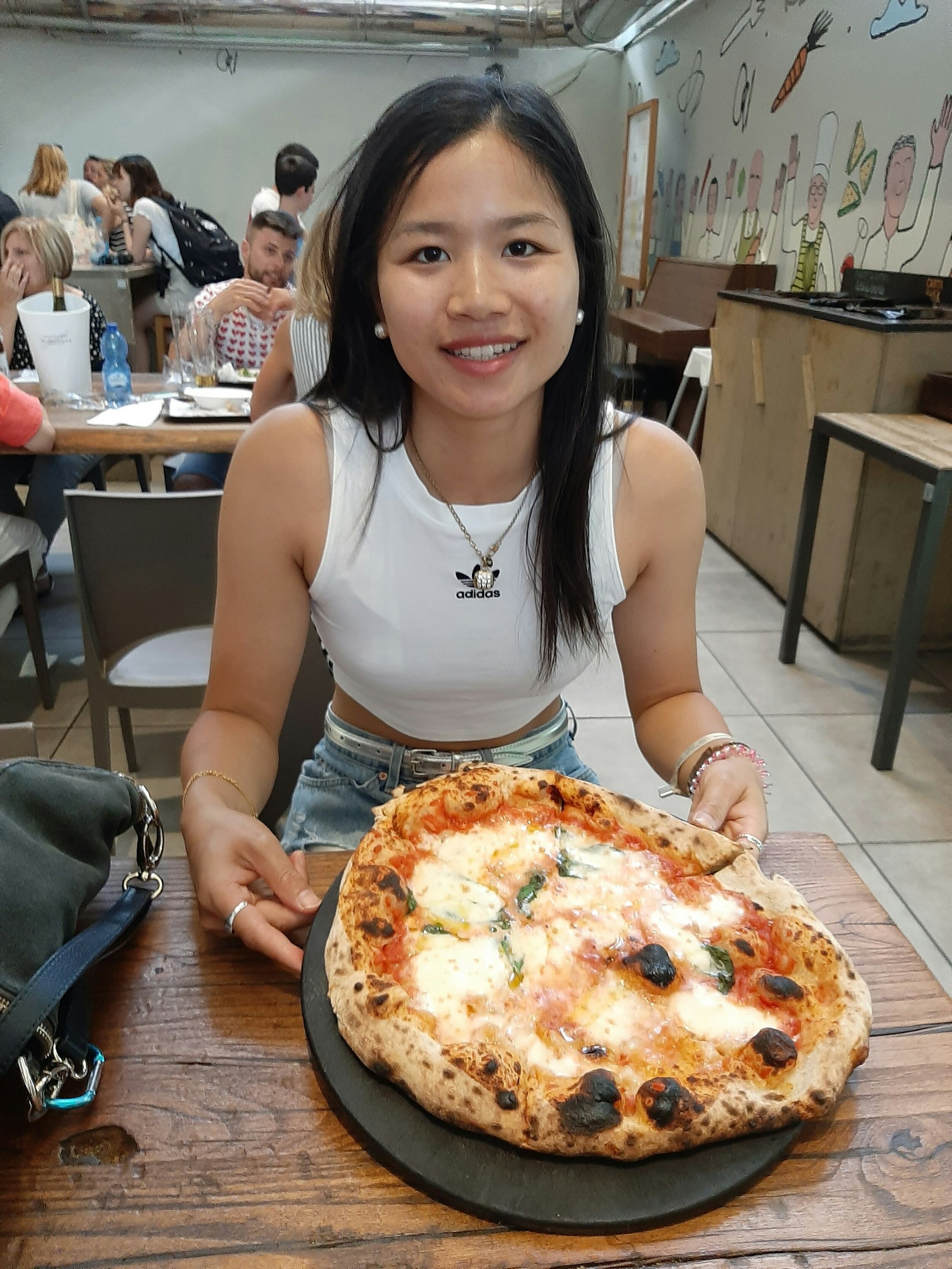 Bjana with a pizza